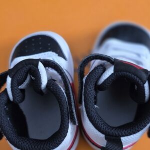 Nike Kids Black, White, and Red Sneakers